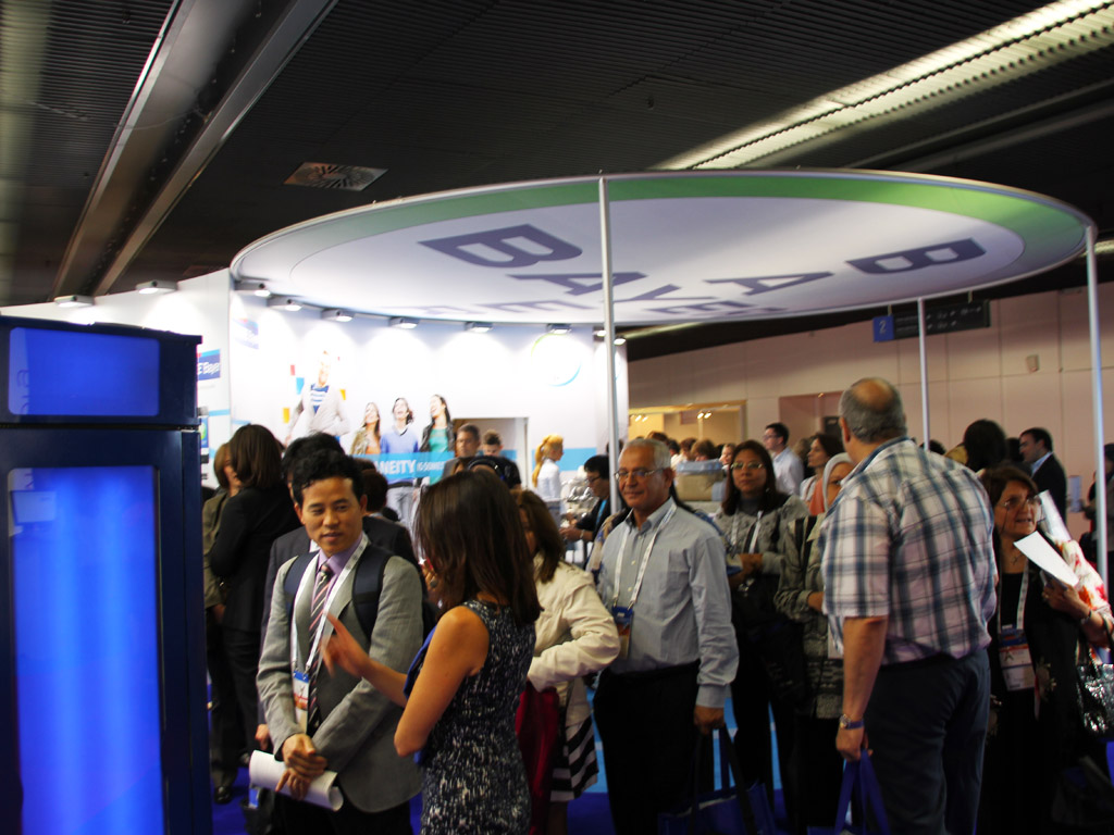 Guests admiring the completed mosaic at Bayer, Paris
