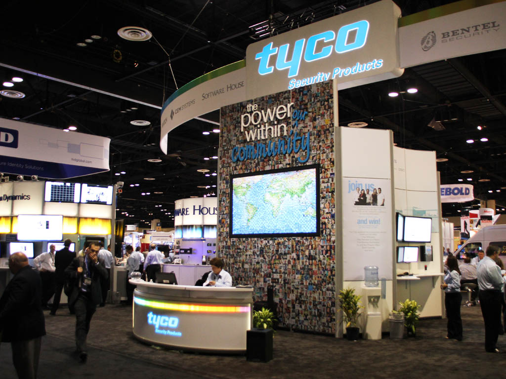 Guests viewing the completed Live Digital Mosaic wall at Tyco ASIS 2011