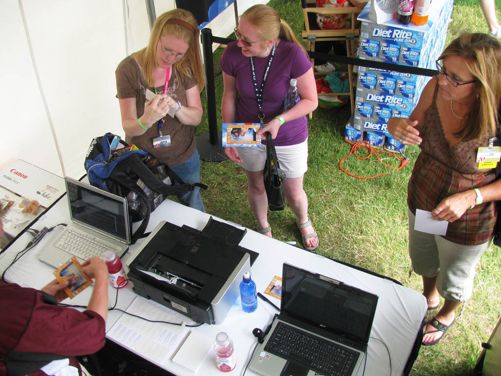 Guests interacting with the Walmart Shareholder's Convention Live Digital Mosaic booth