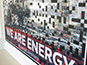 Progress shot of the We Are Energy mosaic wall during assembly